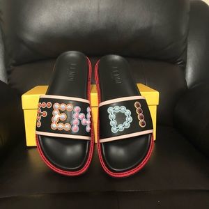 FENDI SLIDES SIZE 11 WIDE. Don’t ask the obvious